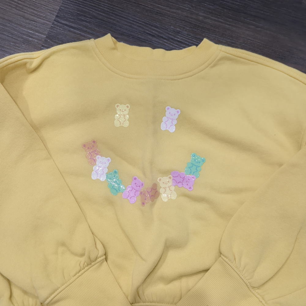 Yellow Sweatshirt with Colorful Bear Design